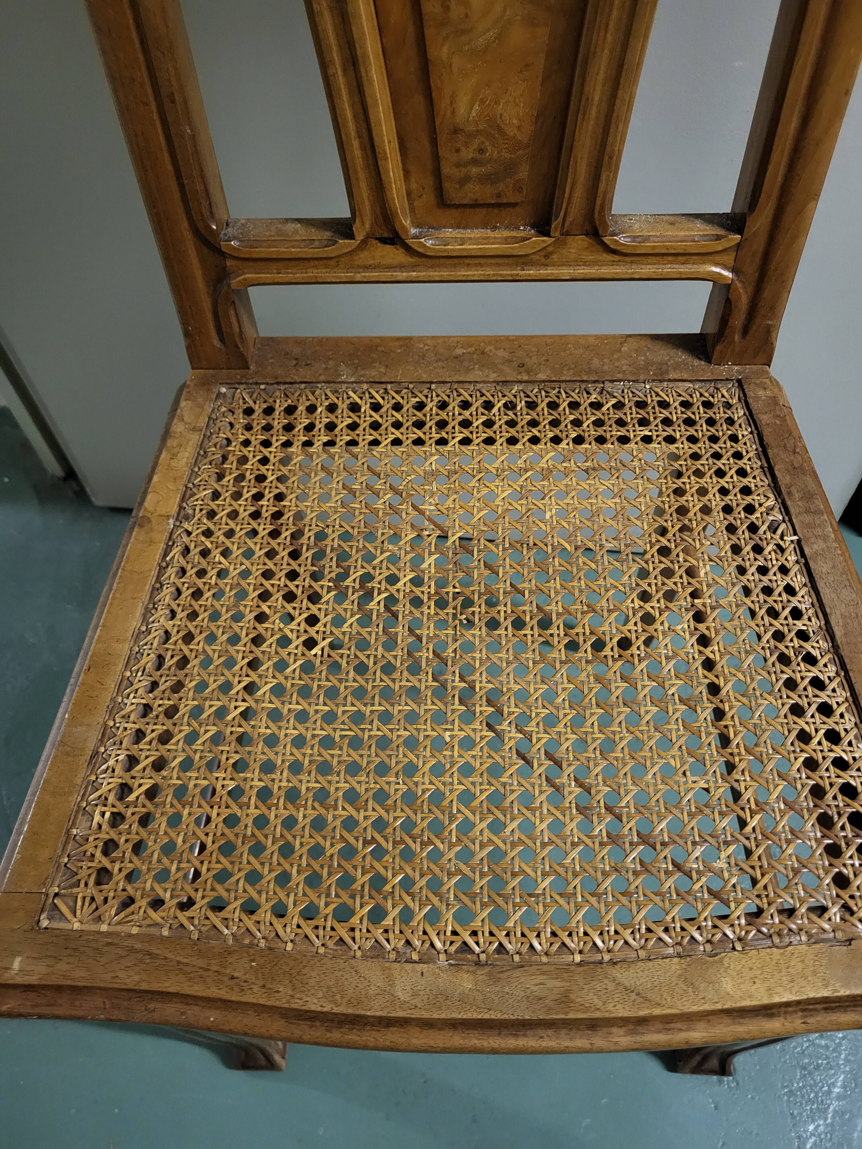 Table and 10 Art Nouveau style chairs.