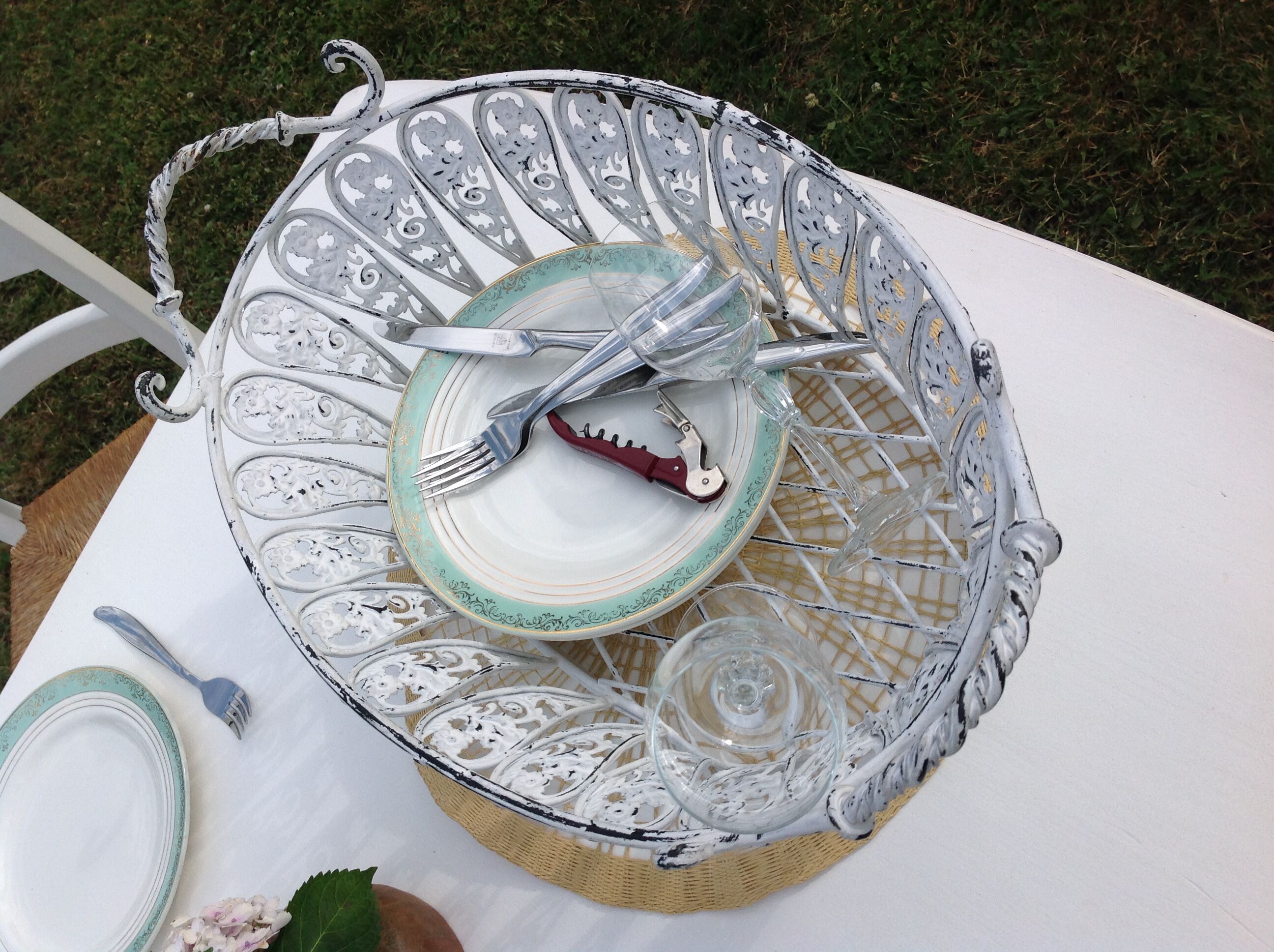 White farmhouse table set and four chairs