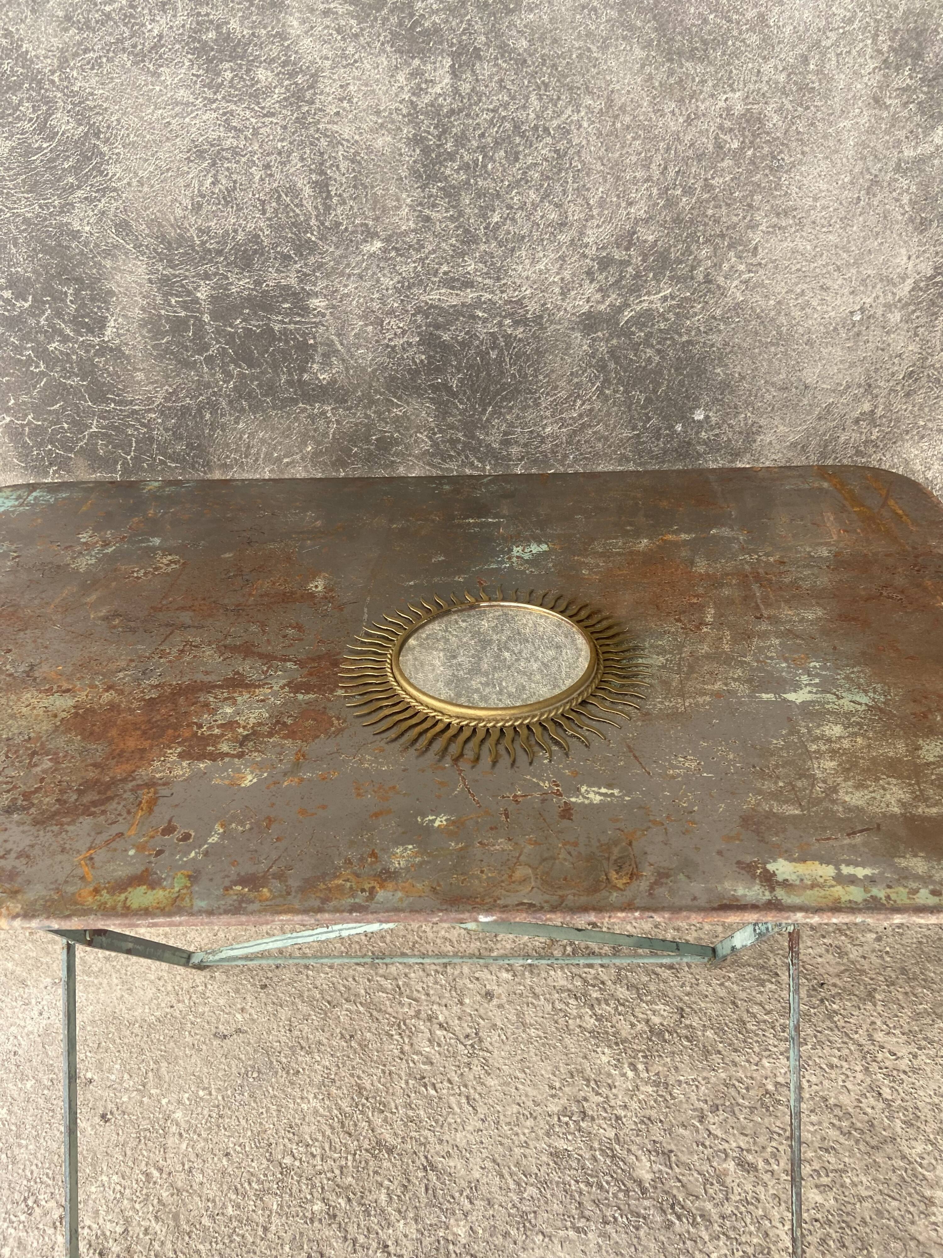 Vintage gold metal sun mirror