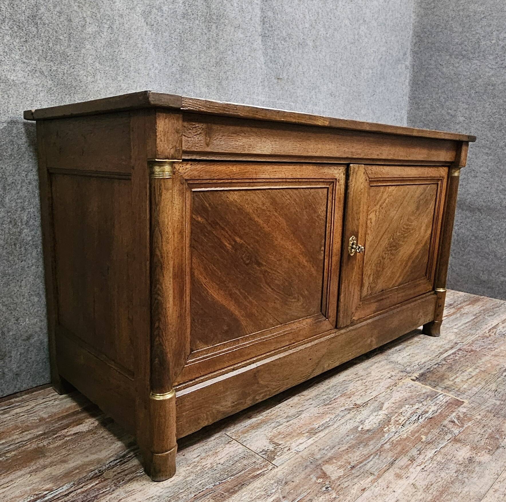 Buffet from the Empire period in solid oak, transformed on the back into a counter.