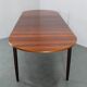 1960s Danish extendable palisander dining table, 4 leaves, restored