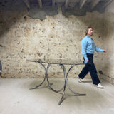 Smoked glass oval table from the 1970s.