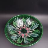 Green faience bowl decorated with multicolored drips around 1970