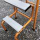 Orange metal step and skaï