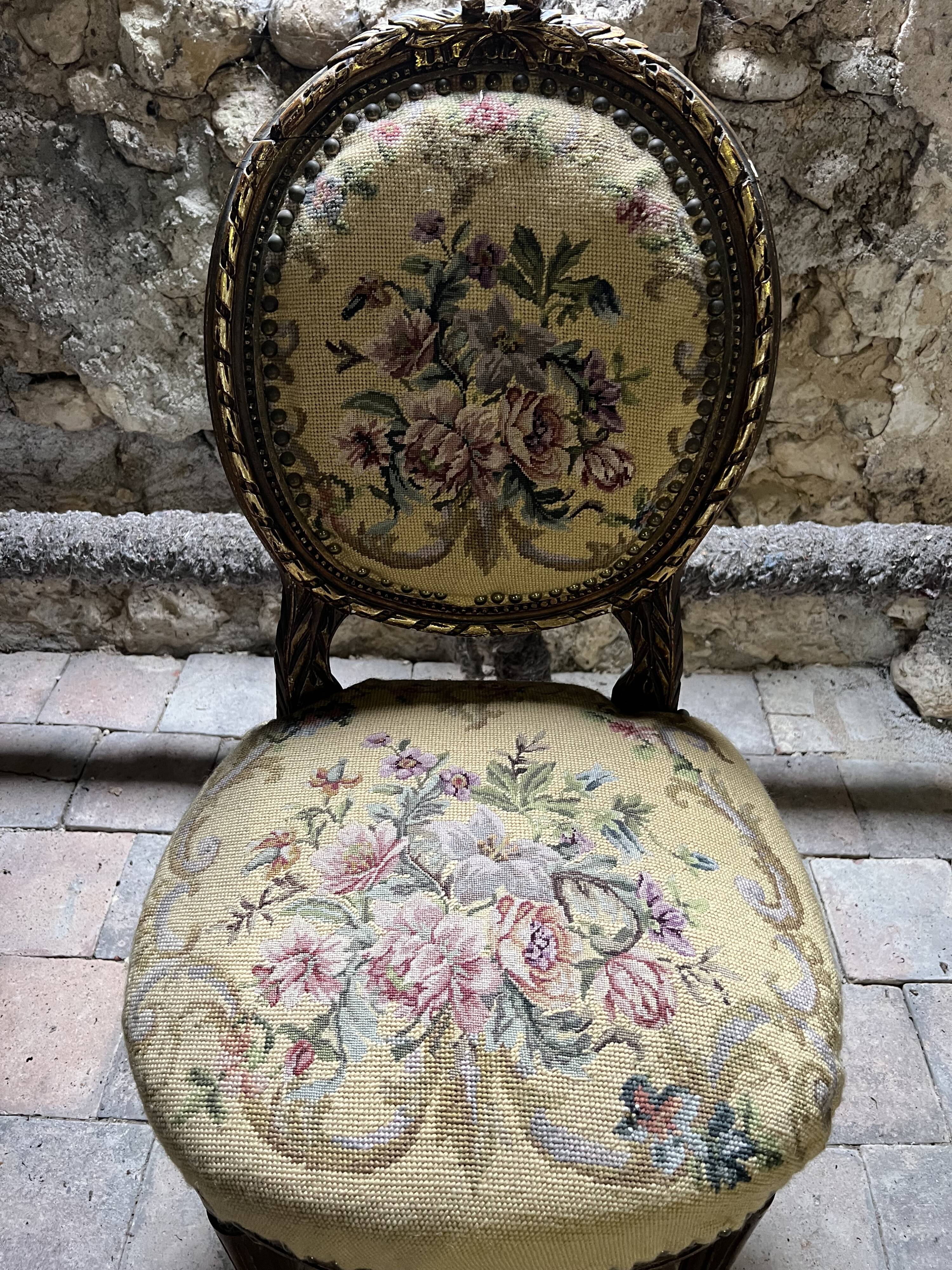 pretty pair of Louis XVI style chairs, in carved and gilded wood