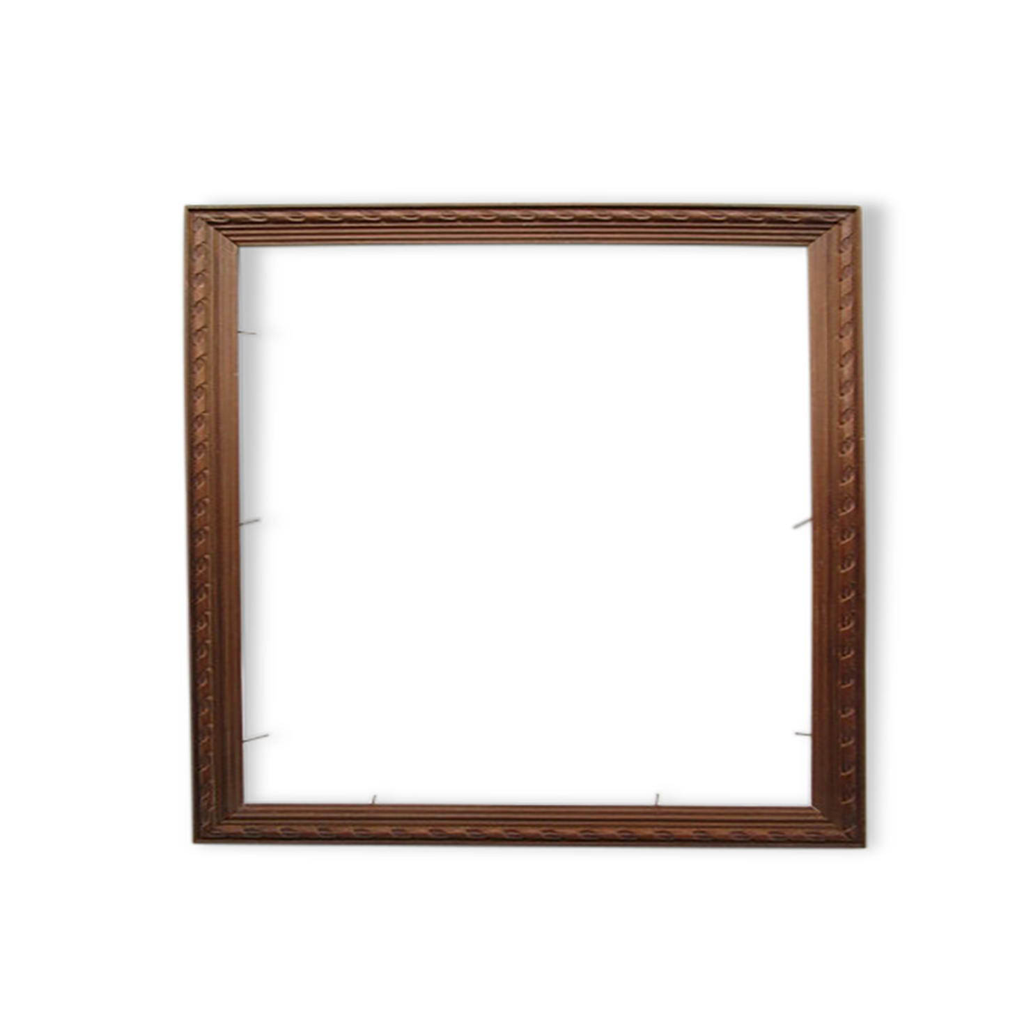 Old frame in worked wood