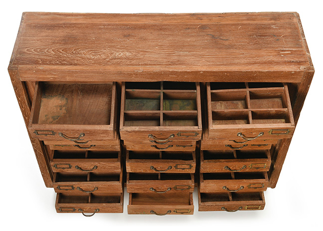Old teak storage cabinet with 21 drawers