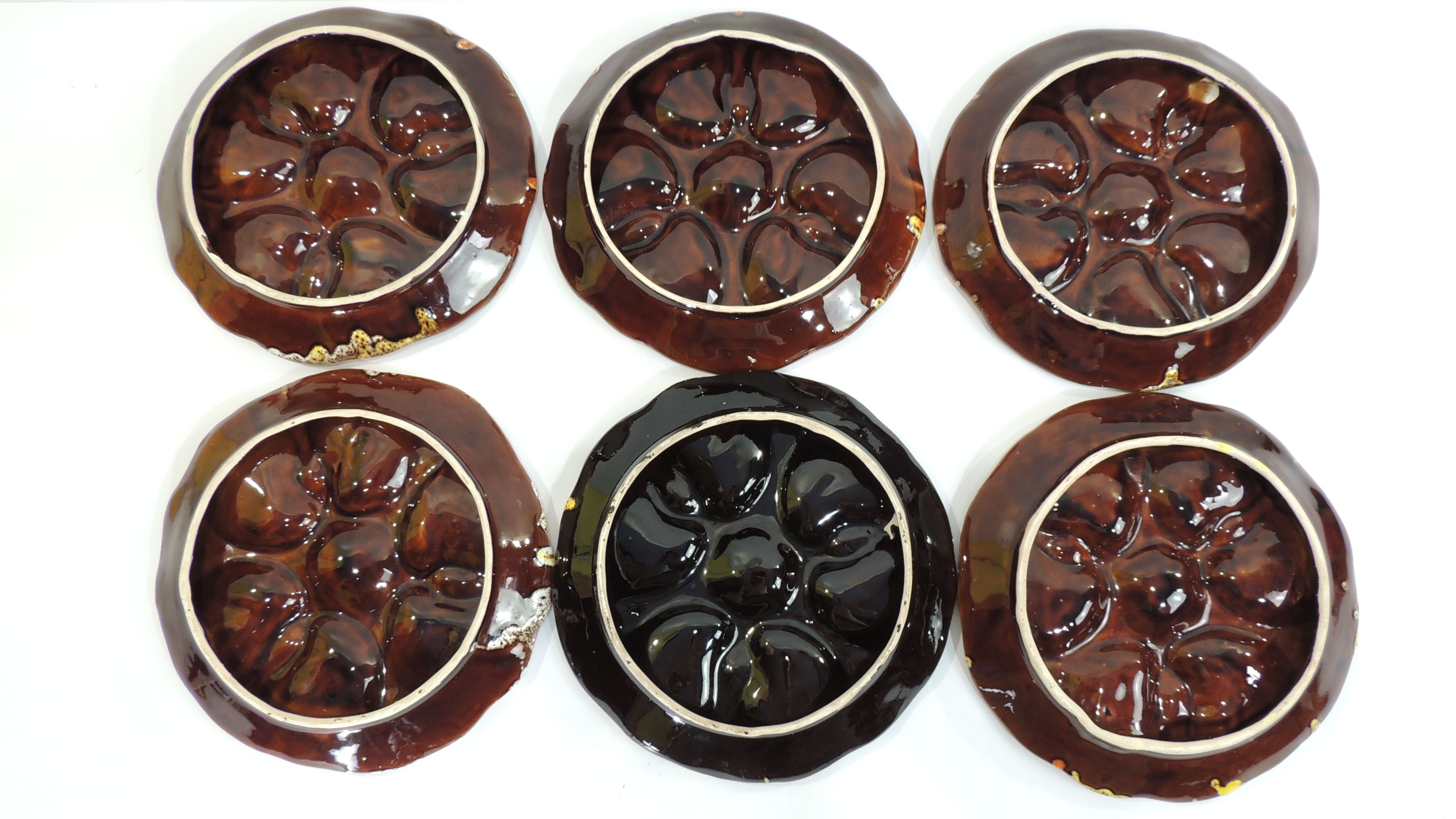 Lot six oyster plates /slip/faience
