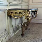 Transitional console in carved and gilded wood, France, 18th century
