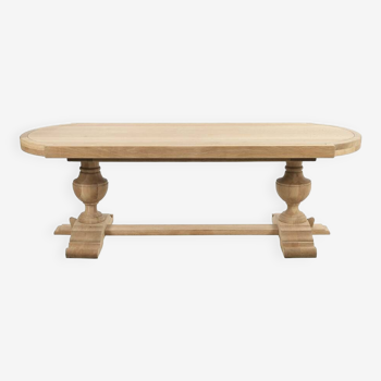 Grande table ovale en bois brut