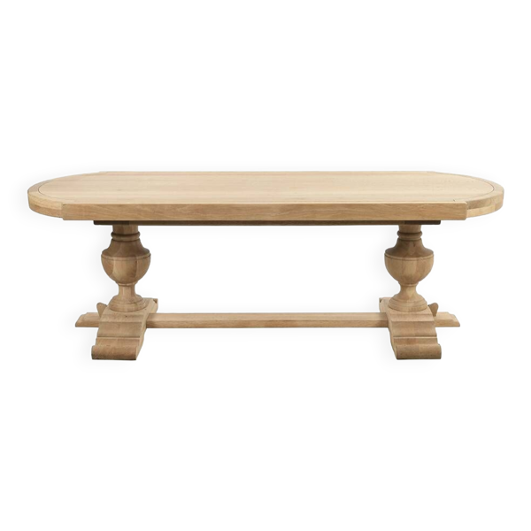 Grande table ovale en bois brut