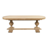 Large oval table in raw wood
