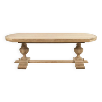 Grande table ovale en bois brut