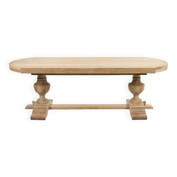 Grande table ovale en bois brut