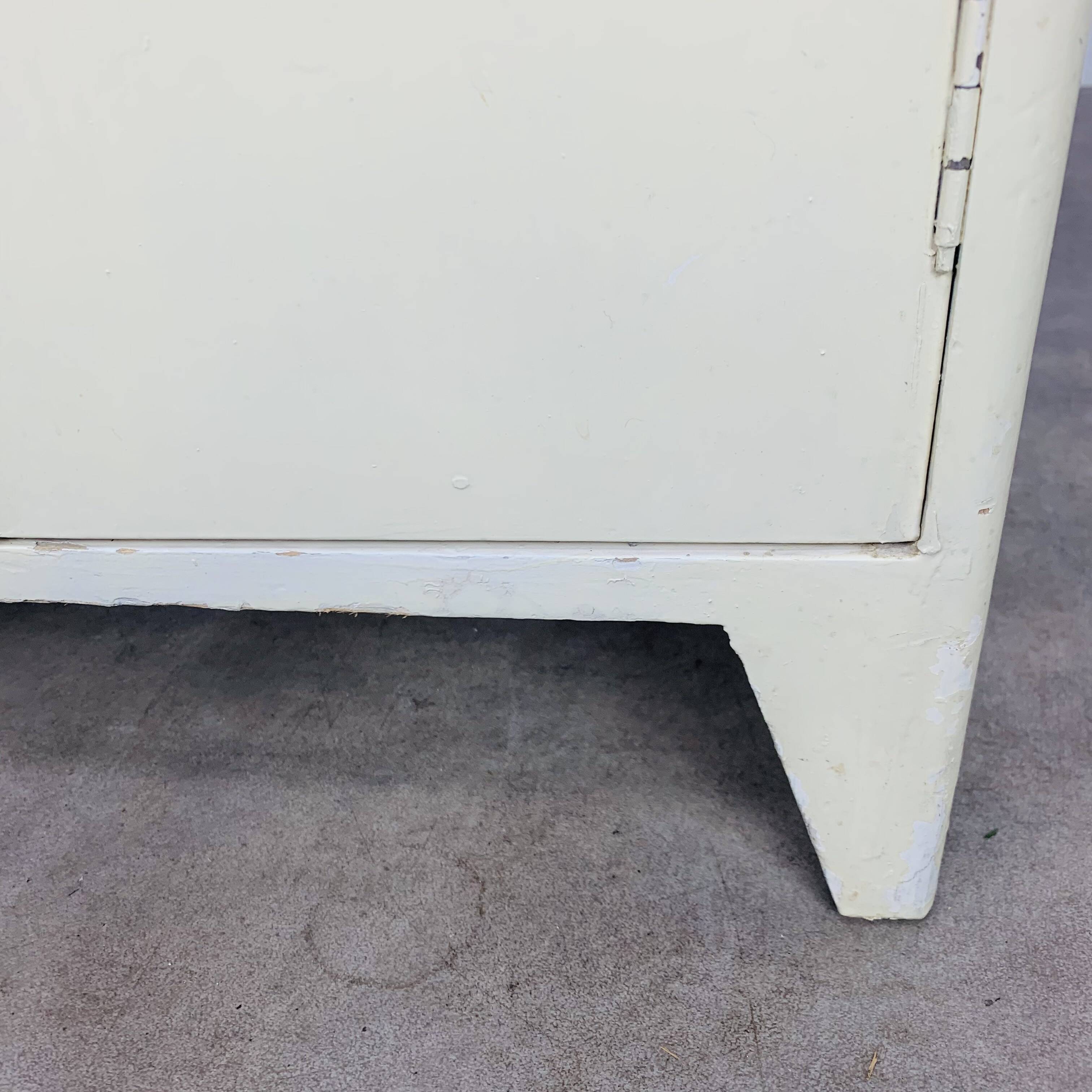White wood convenient storage unit from the 1950s