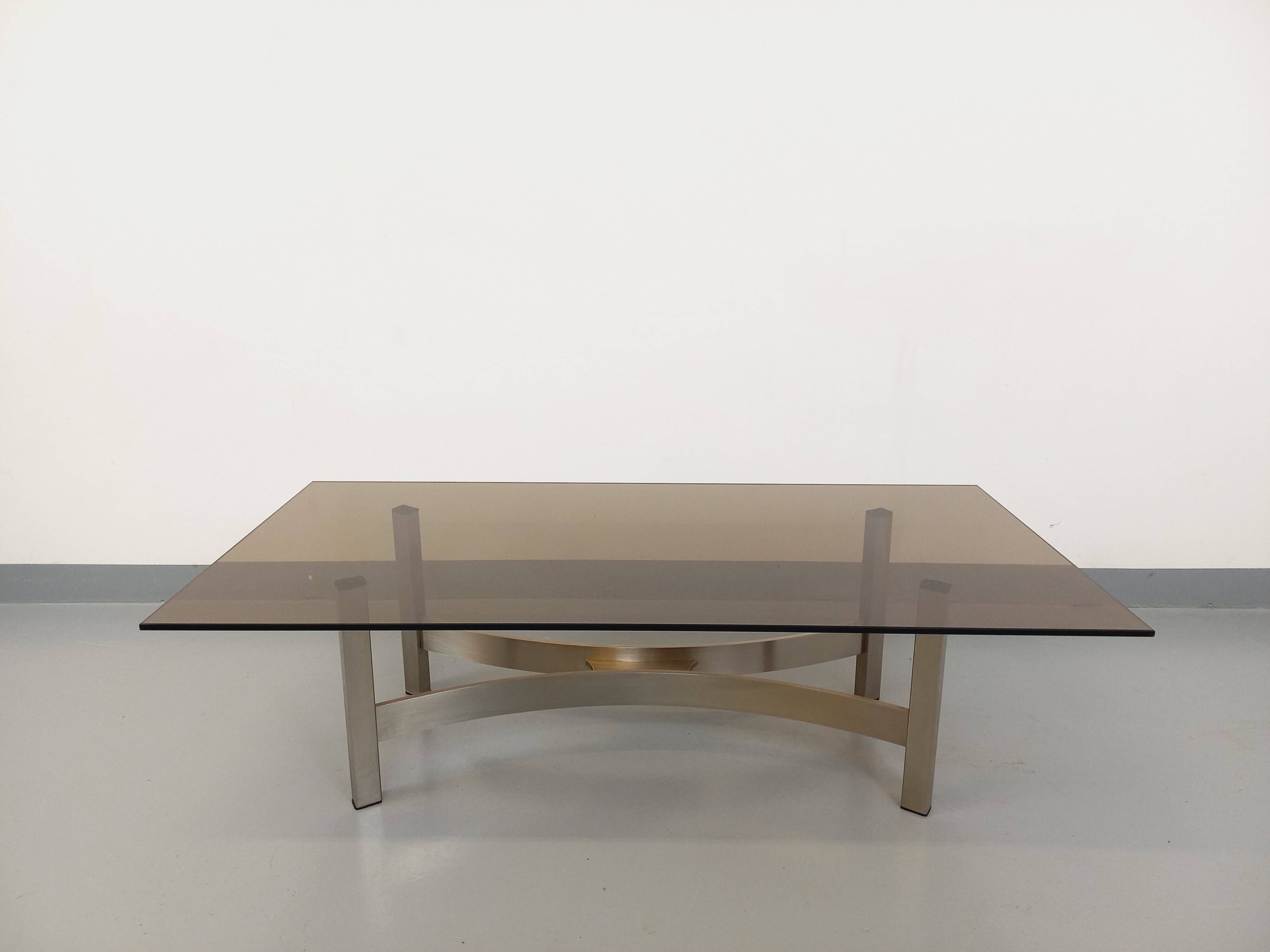 Vintage coffee table in smoked glass and brushed cast aluminum from the 70s