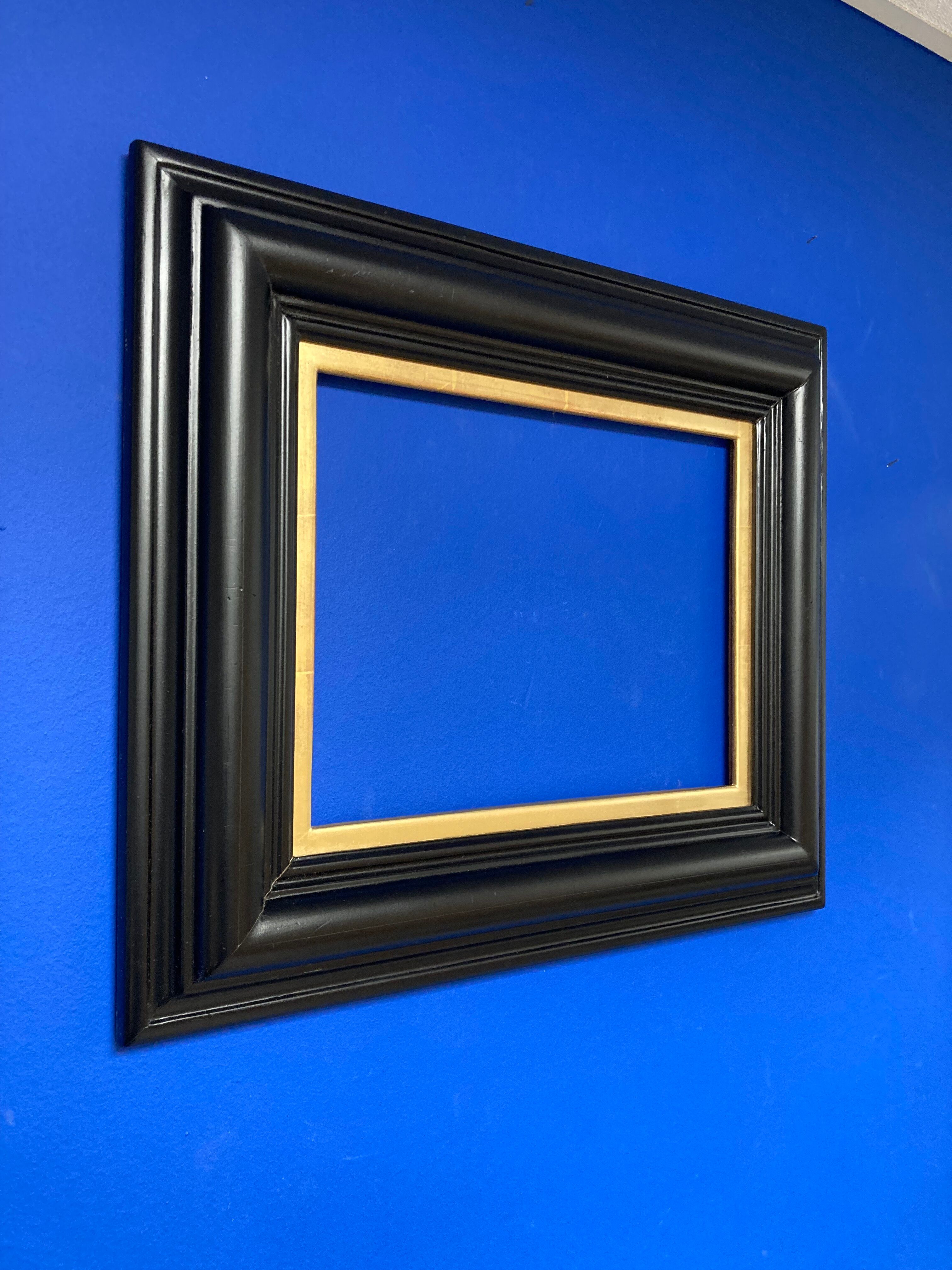 Black frame and vintage gold