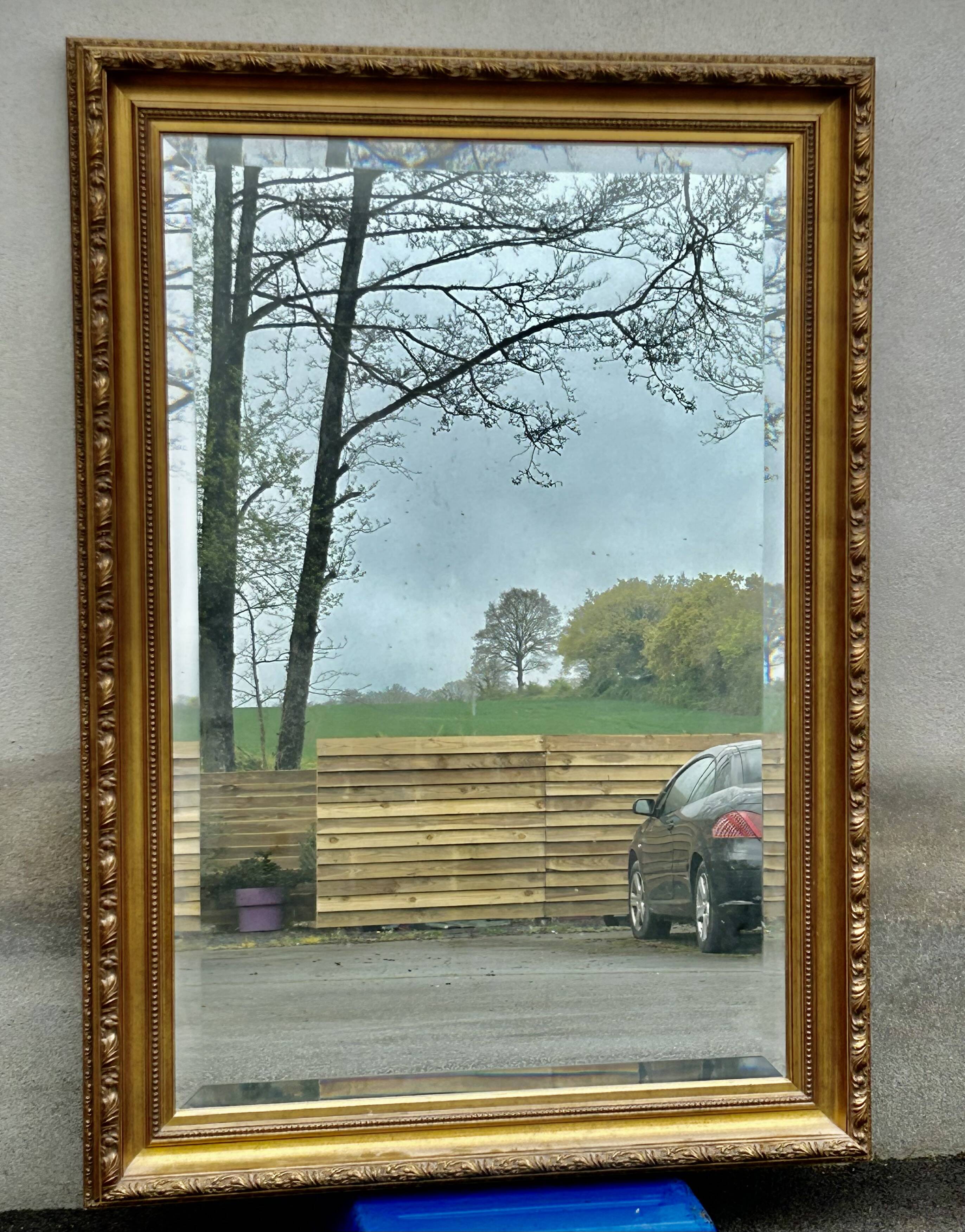 Large bevelled mirror, wood and gilded stucco, Louis XVI style - 140 x 100 cm