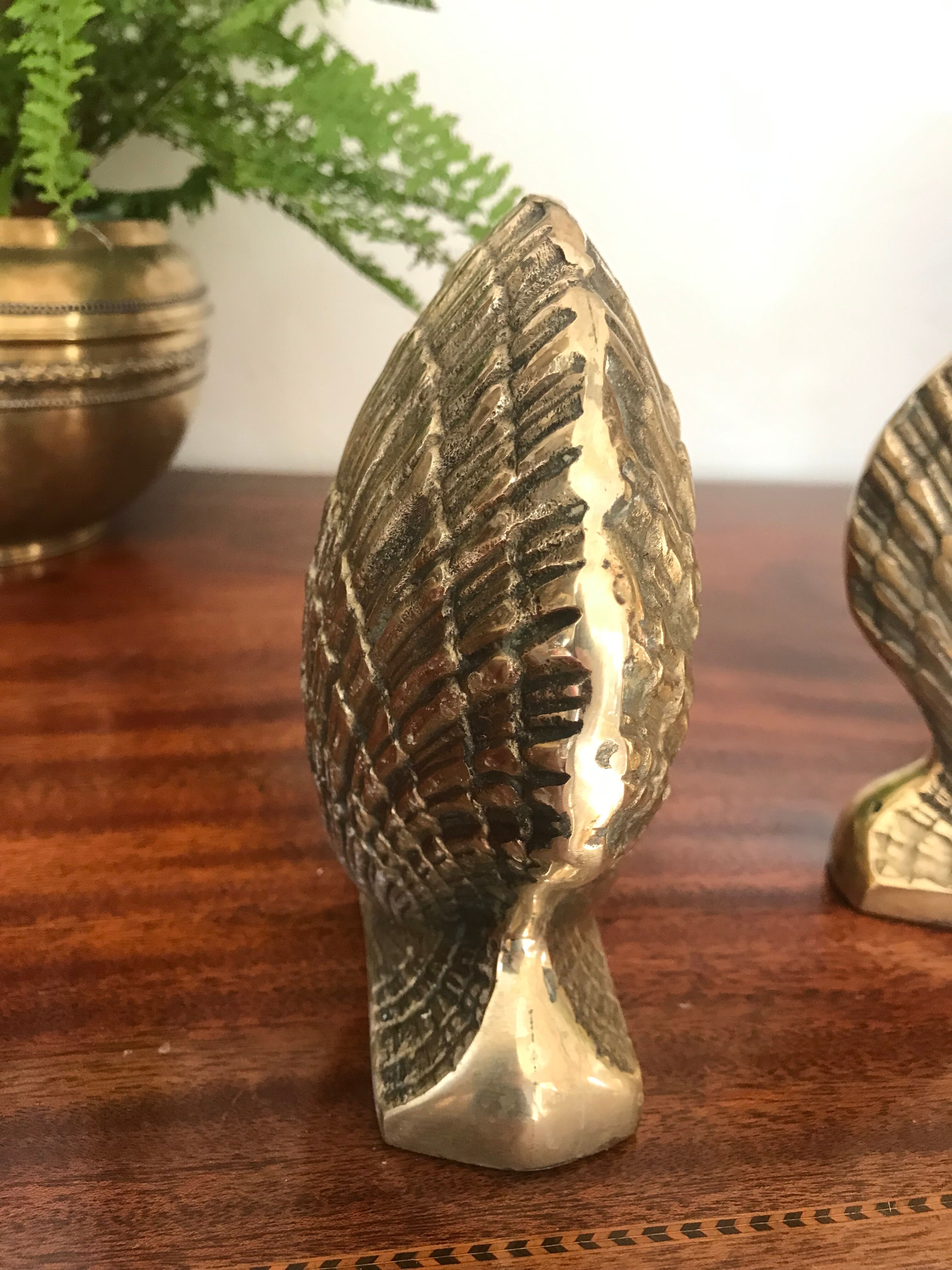 Pair of brass shell book clamps