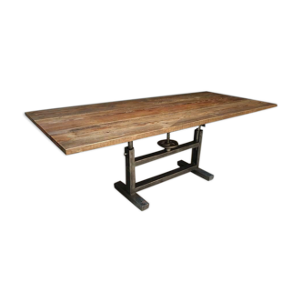 Industrial wooden dining table on machine base