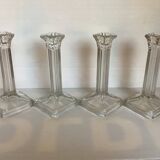Four old square molded glass candlesticks