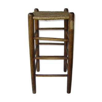 Ancient wooden and straw stool