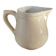 Petit pot à lait ancien en Terre d'acier