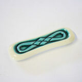 Set of twelve turquoise ceramic knife holders