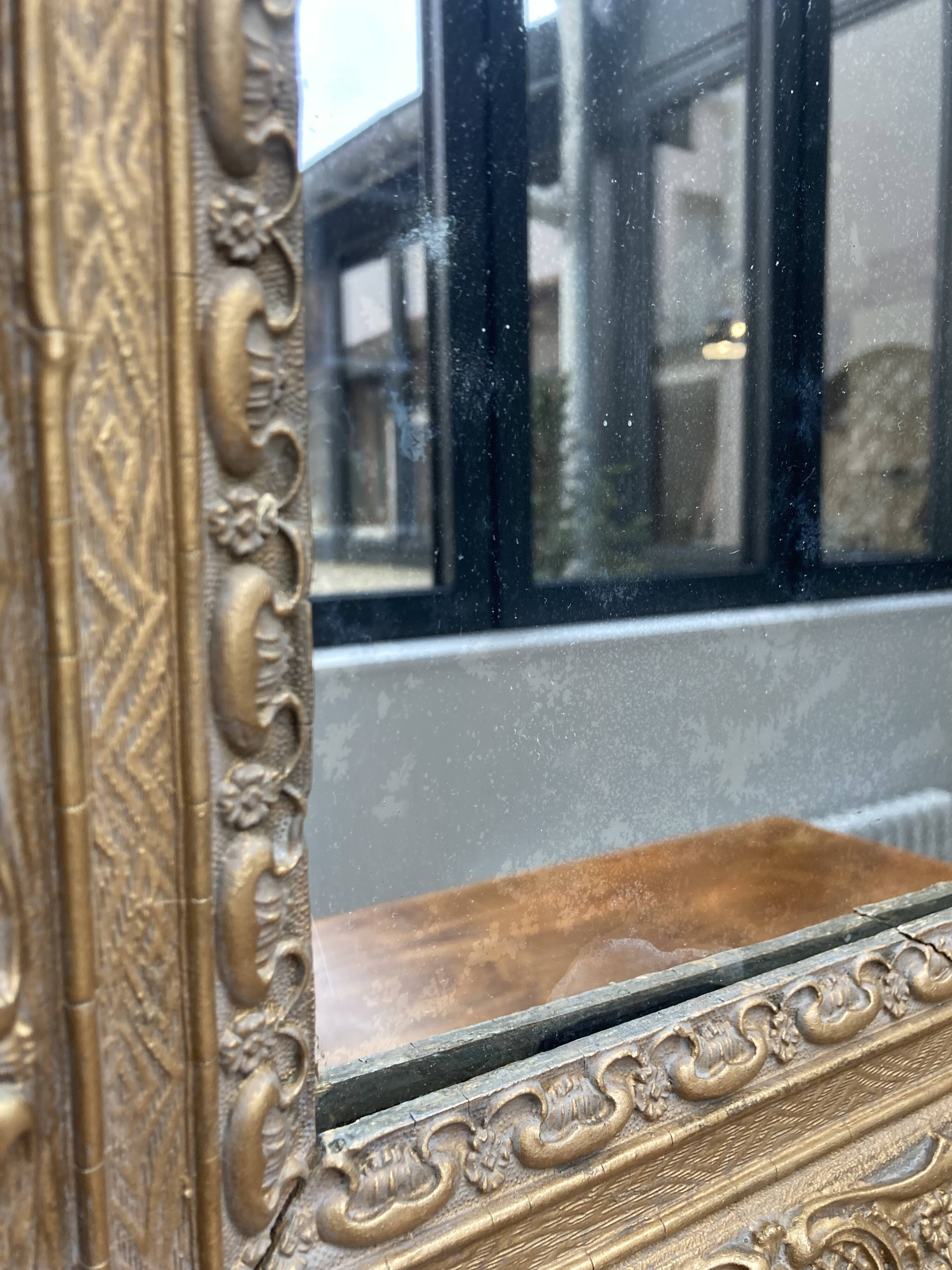 Gilded mirror in wood and stucco, 19th century, 60x88cm