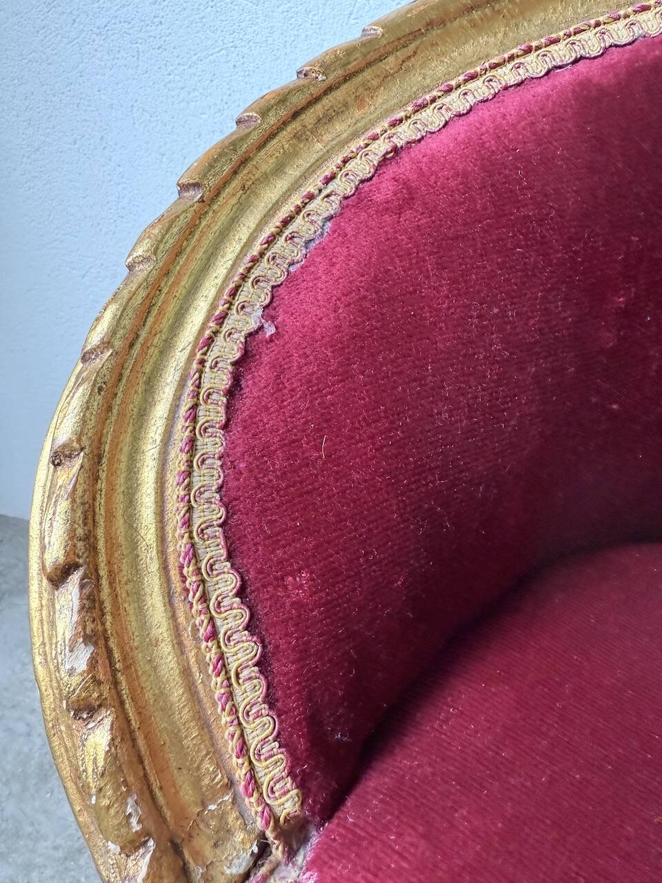 Louis XVI gilt wood and red velvet armchair