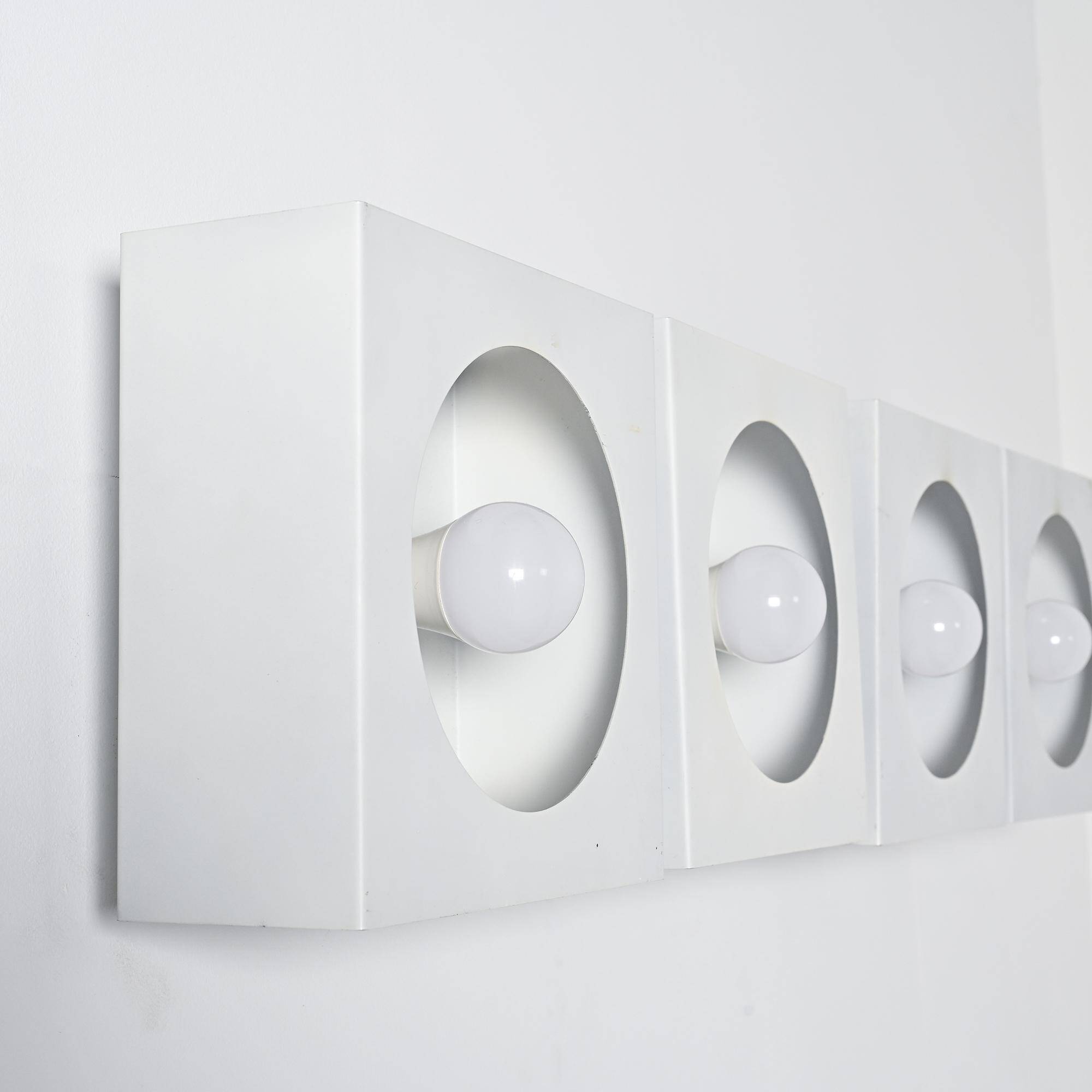 Set of 4 wall lights 2091 by Guy Bertrand for Disderot, circa 1965.