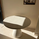 Travertine-effect stone dining table