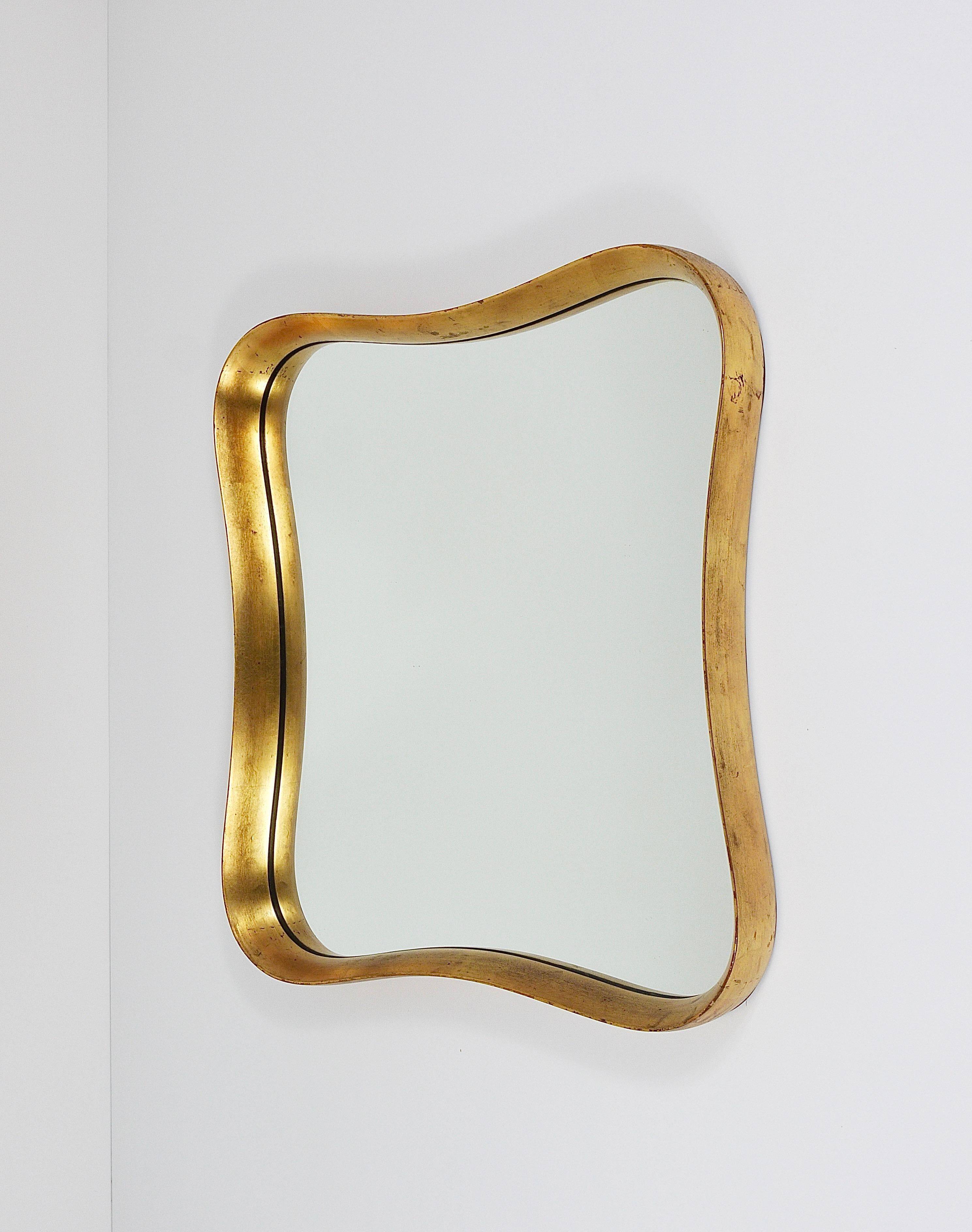 Golden wooden mirror in the style of Gio Ponti by Max Welz, Vienna, Austria, 1940s.