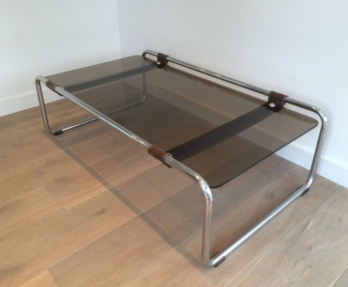 Coffee table in chrome, leather and smoked glass