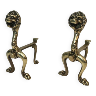 Pair of bronze andirons with lions