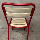 Red and white Tolix chair
