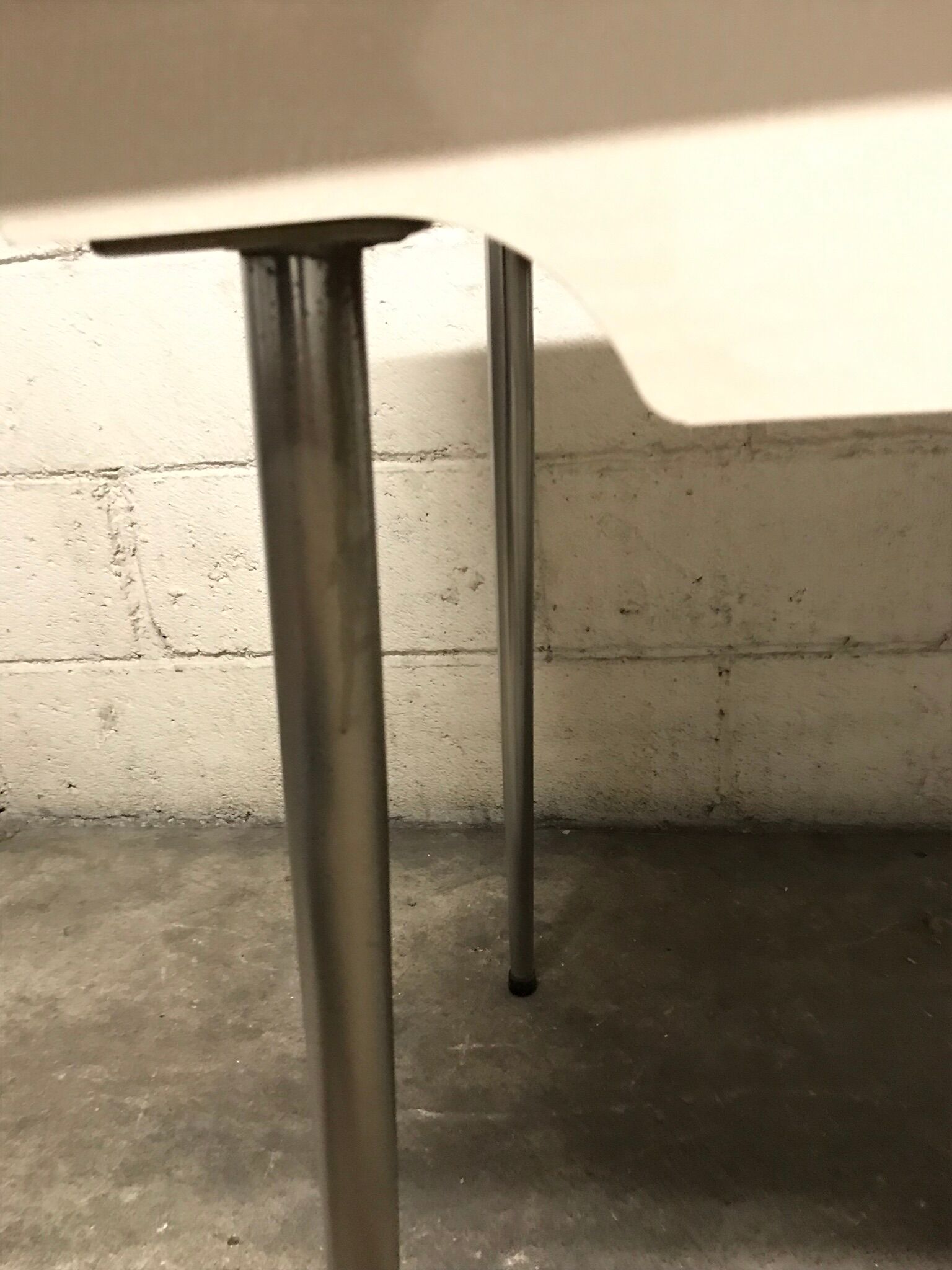 Off-white formica table / 70s cream with a tapered foot drawer