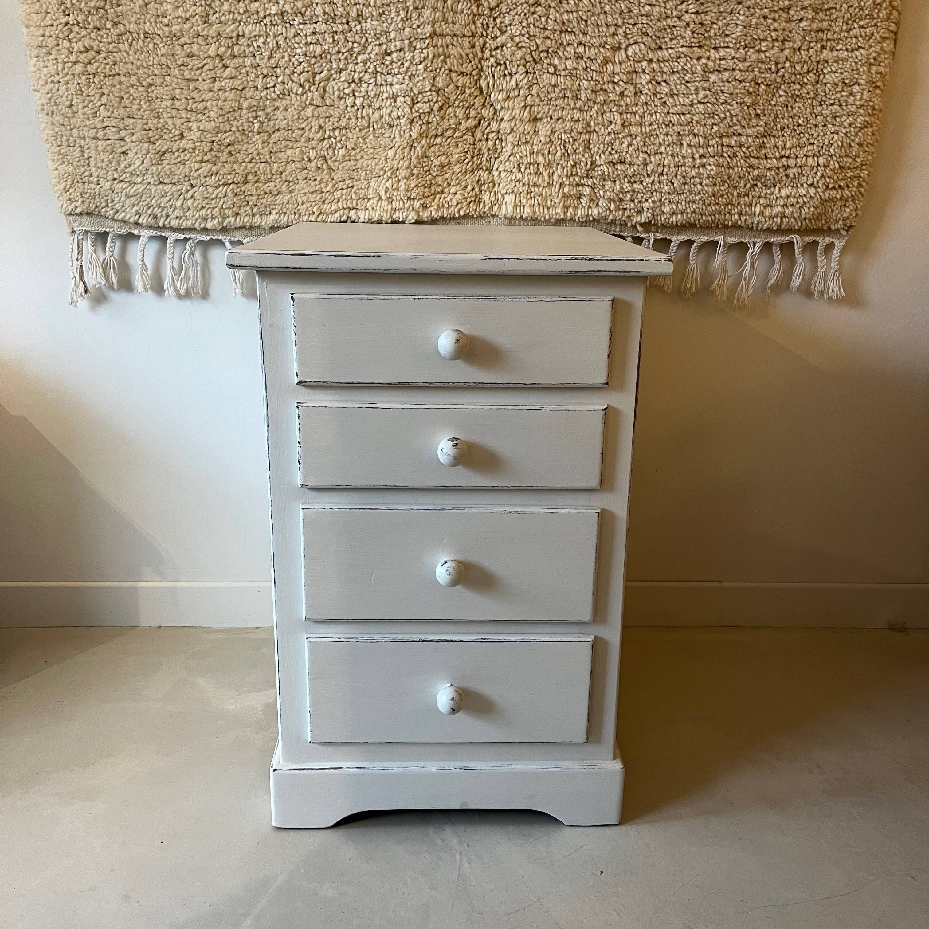White patinated chest of drawers