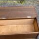 Vintage oak chest bank in dark wood, Louis XV style.