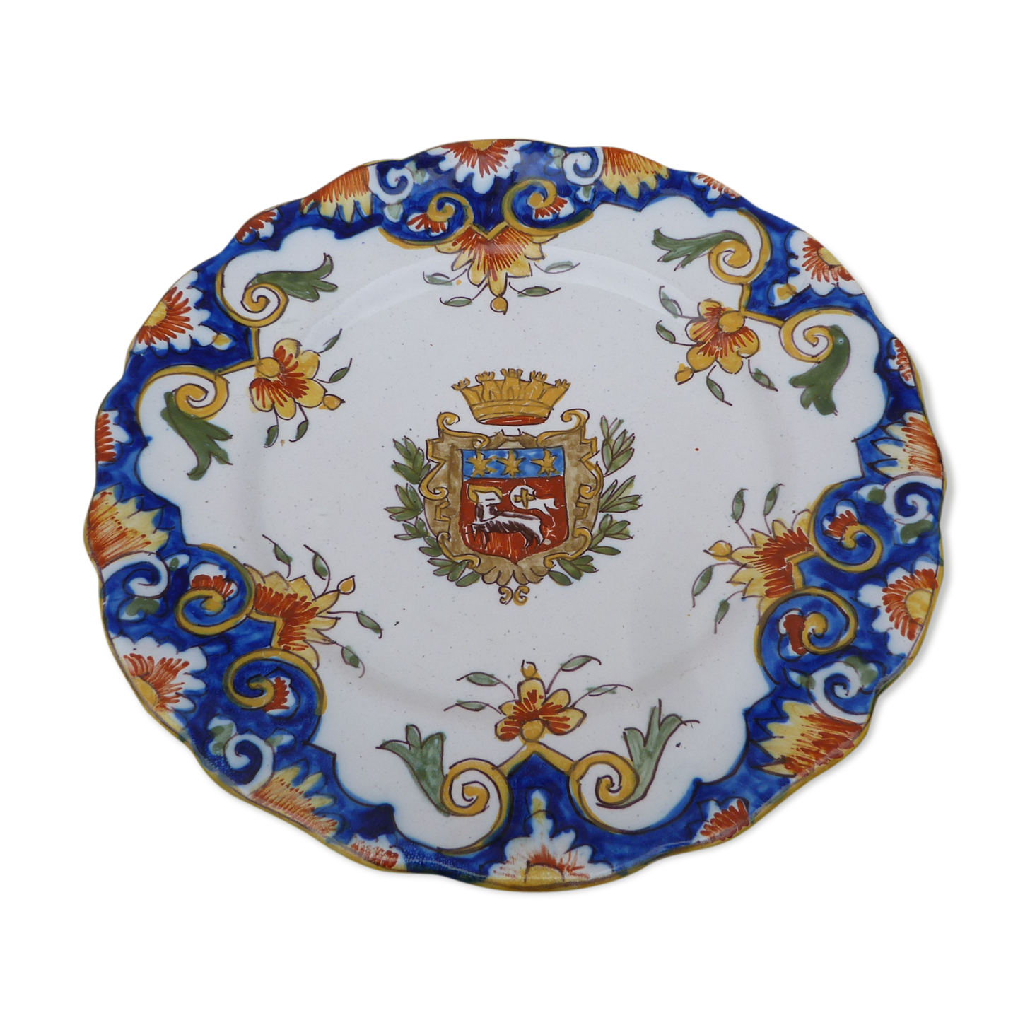 18th century plate in Rouen's faience with coat of arms and floral motifs