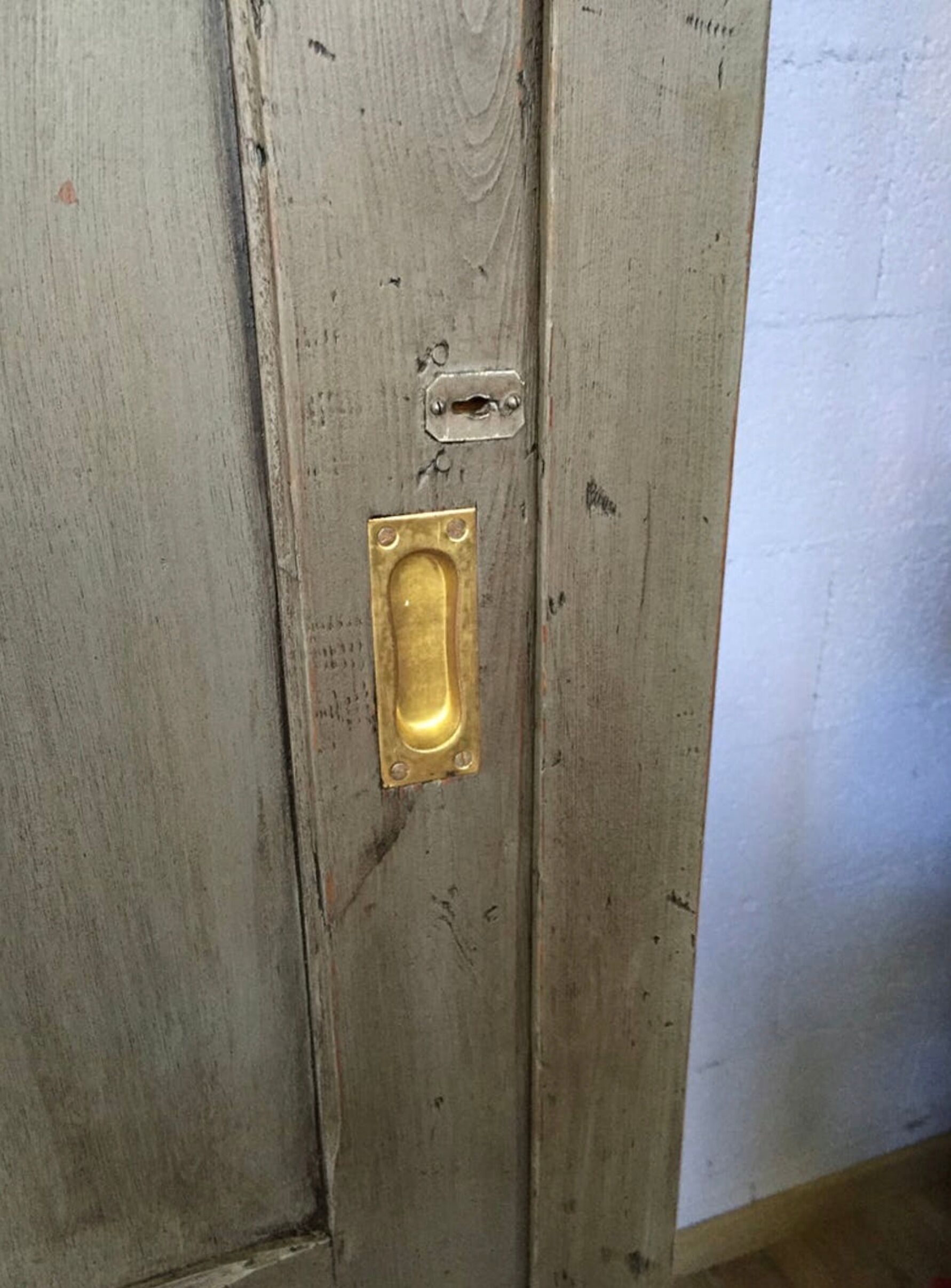 Old wooden cupboard massive sliding doors