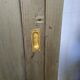 Old wooden cupboard massive sliding doors