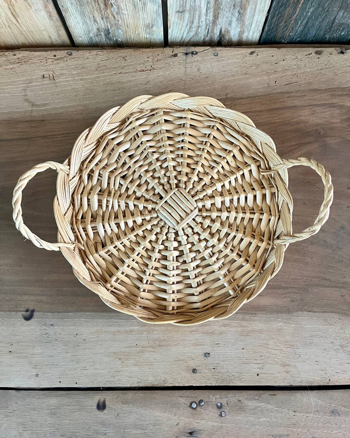 Vintage round flat rattan basket