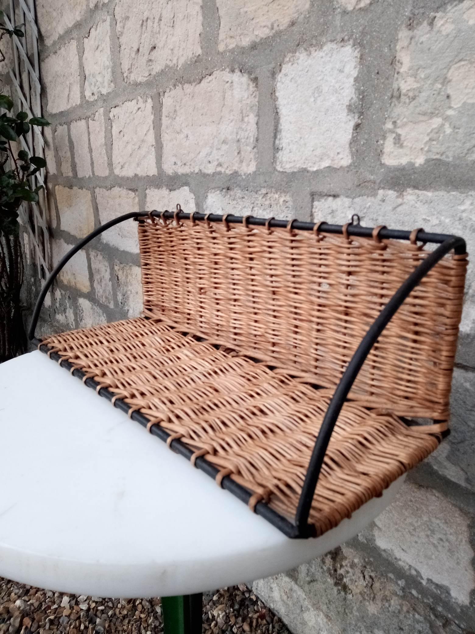 Rattan and steel shelf