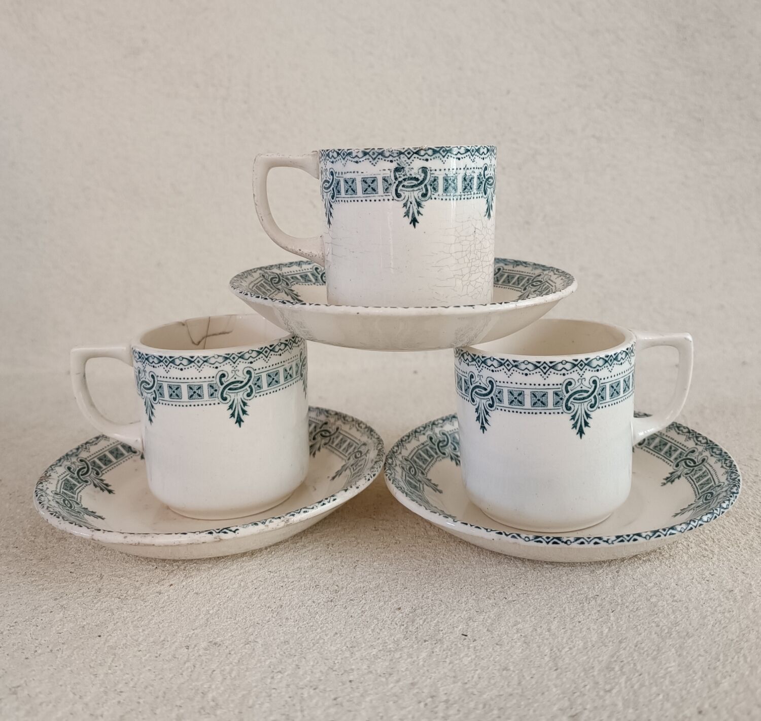 3 cups and saucers iron earth
