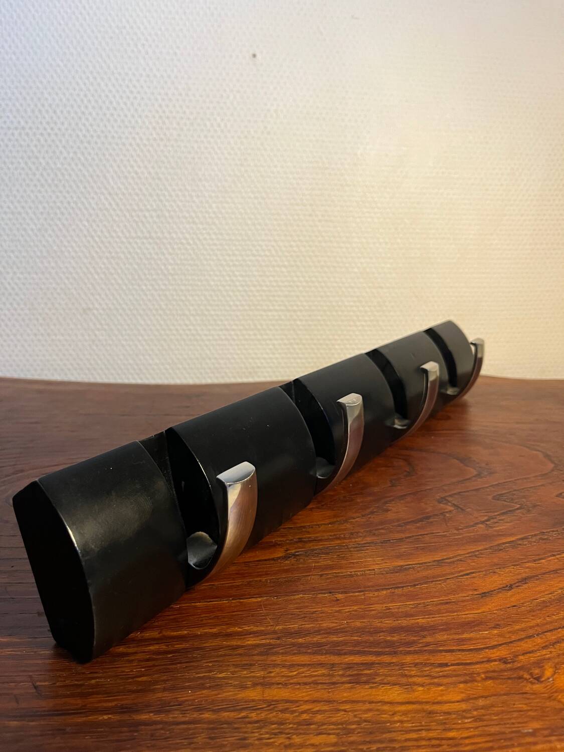 Designer metal and wood wall coat rack
