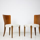 Ensemble de quatre chaises à manger restaurées modèle H-214 conçu par Jindřich Halabala, années 1950.