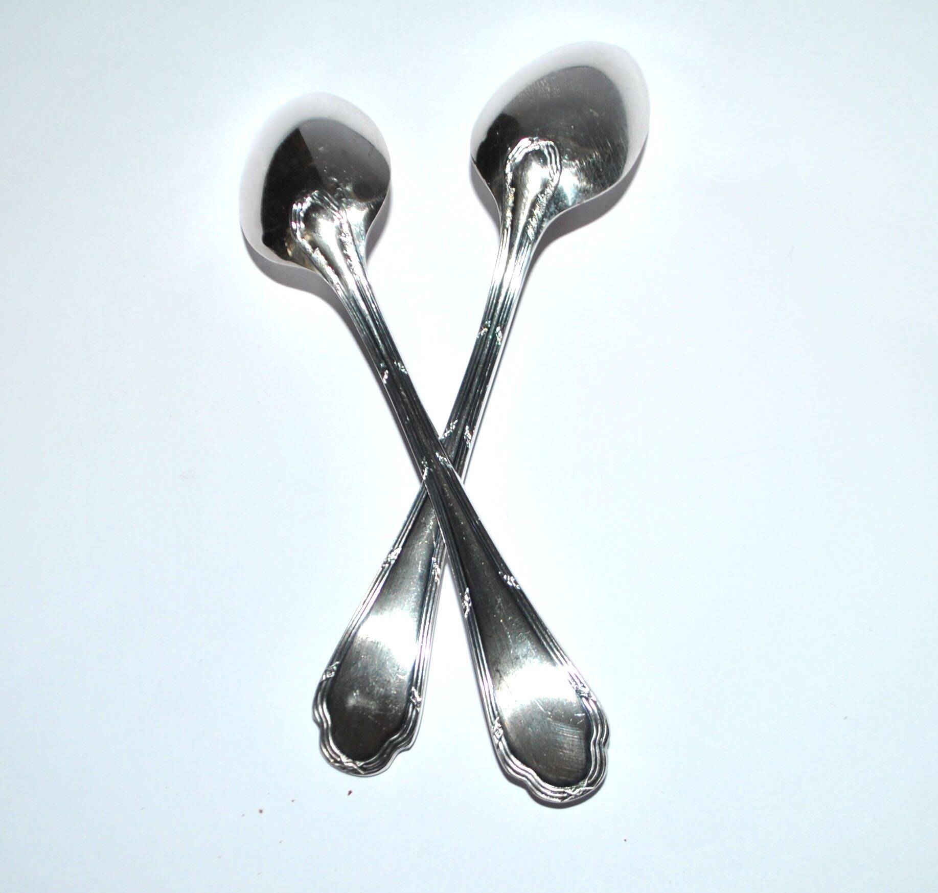 Ercuis set of 2 Trianon silver-plated dessert spoons with crossed ribbon, 15 cm