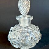 Old perfume bottle in molded