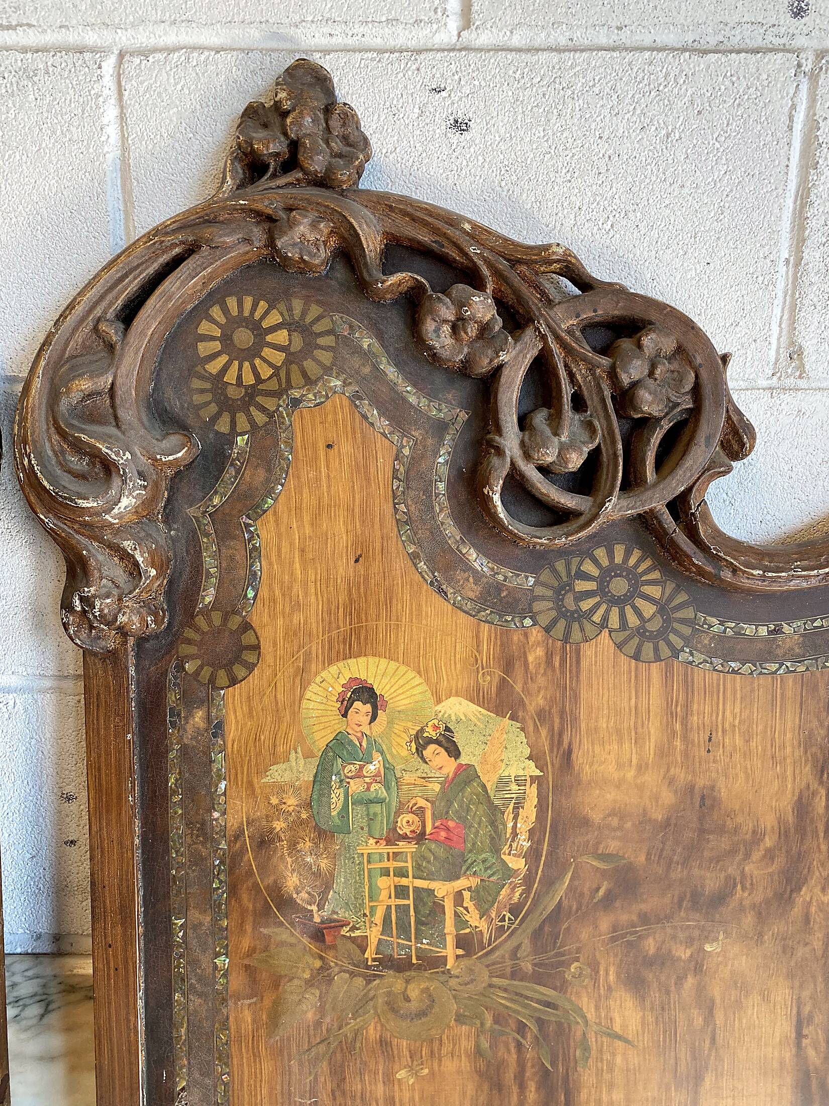 Pair of Art Nouveau cast iron headboards, Italy circa 1900
